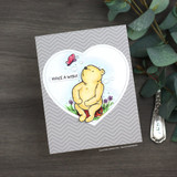 Gray chevron card with Pooh in a white heart frame and 'MAKE A WISH'