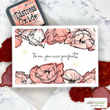 White card with peach layered poppies across the top and the script sentiment stamped beneath, styled with a distress oxide ink pad.