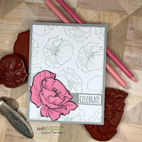 Grey card with faint outline poppies behind one bright pink poppy and a small label reading Celebrate.