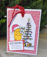 Red word-print card with a tag and red twine: Pooh in his Santa hat by a star-topped tree with the merriest-time sentiment.
