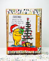 Card with festive floral papers and a red base: Pooh trims his tree under a “CHRISTMAS, Seems to me, it's the merriest time of them all” panel.