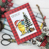 Red buffalo-plaid framed card: Pooh in a Santa hat decorating a star-topped tree above “A Christmas wish from me to you.”