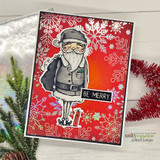Card with a gray-suited Santa on a red snowflake background and 'Be merry.'