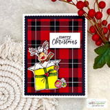 Card with the reindeer in a yellow gift over red buffalo plaid and 'merry Christmas.'