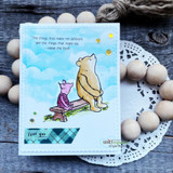 Handmade card with Pooh and Piglet colored on a bench against a soft blue sky, sentiment 'the things that make me different are the things that make me - Winnie the Pooh.'
