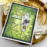 Lime green spiderweb card of the ghost on a black distressed frame.