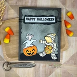 Grey card with ghost Piglet and mummy Pooh and a stamped 'Happy Halloween.'