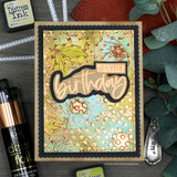 Gold-foiled birthday card with the floral background under a die-cut 'birthday'