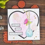 Pink card with a heart-framed floral vase and "take time to make your soul happy."