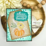 Teal card with a kraft hexagon panel, a white embossed pumpkin and sunflower, and a teal label reading fall is proof that change is Beautiful.