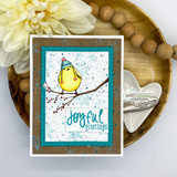Teal card with the yellow bird on a branch and 'joyful greetings.'