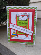 Card with a green mailbox on a red-and-green frame, 'Making spirits bright.'