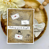 Vintage kraft card with envelopes and postmarks, 'A Merry Christmas to you,' 'Making spirits bright.'