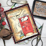 Card with a red mailbox framed on vintage postal papers, 'A Merry Christmas to you.'