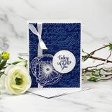 Navy card with a heart in a scalloped circle die and 'today you are loved'