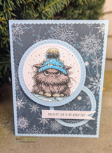 Card with a gnome in a scalloped circle die and 'you're the best gift under the tree'
