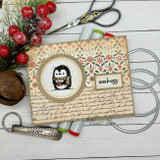 Card with a penguin in a scalloped circle die and 'monkey'