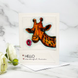 Handmade card featuring a scalloped, stitched square die-cut frame.
