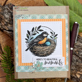 Handmade card featuring a scalloped, stitched square die-cut frame.