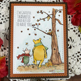 Copper-framed card with colored Pooh and Piglet by the tree and the grateful sentiment.