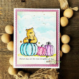 Card of Pooh with blue and pink pumpkins under clouds, 'fallish days are the most delightful of days.'