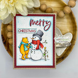 'Merry Christmas' die-cut card of Pooh and his top-hatted snowman with red ornaments