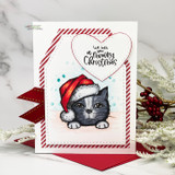 Card with a gray Santa-hat cat, a heart and 'We wish you a meowy Christmas.'