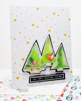 Card of the trio of trees under a gold-star sky, 'on christmas tree.'