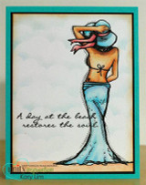The beach woman in a teal gown on a cloudy blue panel framed in teal with 'A day at the beach restores the soul.'