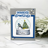 Card with die-cut 'season's greetings' framing a snow globe and 'a Christmas wish just for you'