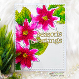 Card with bold pink poinsettias and die-cut 'season's greetings'
