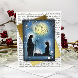 Card with the nativity over deep blue with script paper, 'oh holy night'