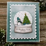 Card of the snow globe on a green postage-stamp frame, 'A Christmas Wish just for you.'