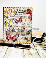 Card with colorful butterflies over the vintage ledger, 'REMEMBER THE NOW.'