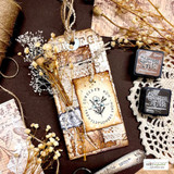Vintage tag with the ledger background and pressed-flower label.