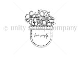 Red rubber stamp sheet with a stitched pocket holding a small bouquet of tulips and blossoms, labeled 'live simply'.