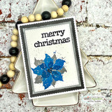 Blue and grey poinsettia on a rustic framed card, 'merry christmas'.