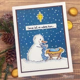 Navy night sky card with white snow dots and pinecones nearby, the snowman at the manger under a gold star, and "Come let us adore him" on a white strip.