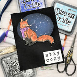 Dark card of the scarfed fox with 'stay cozy.'