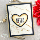 Marbled cream card in a navy scalloped frame, with 'tomorrow NEEDS you' inside a gold-edged die-cut heart.