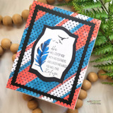 Card with the feather and birds on bold red-and-blue striped papers and the Scripture sentiment