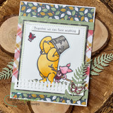 Card with Pooh and Piglet on autumn-leaf patterned paper, 'Together we can face anything.'