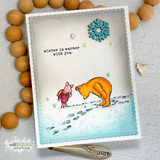Card with Pooh bending to the snowy footprints beside 'winter is warmer with you,' accented with a teal snowflake.