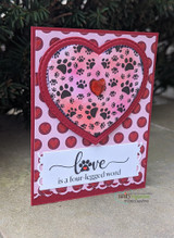 Red polka-dot card with the paw heart in a stitched red heart frame over the script sentiment.