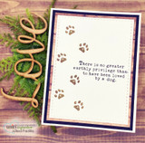 Card with a wooden LOVE word and stamped paw prints forming a heart, a sympathy sentiment, and a fern sprig