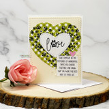 Card with paw prints in a green plaid heart and the word love, with a sympathy sentiment and a pink rose