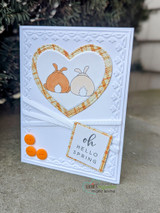 Soft card with a bunny inside a stitched heart frame and an 'oh Hello Spring' tag.