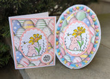 Two coordinating pastel bunny-and-daisy cards, one card and one oval.