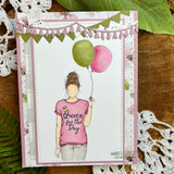 Card of the balloon girl in pink with 'Queen for the Day.'