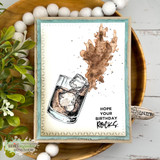 Card with the whiskey glass and an inky splash, "Hope your birthday rocks," greenery